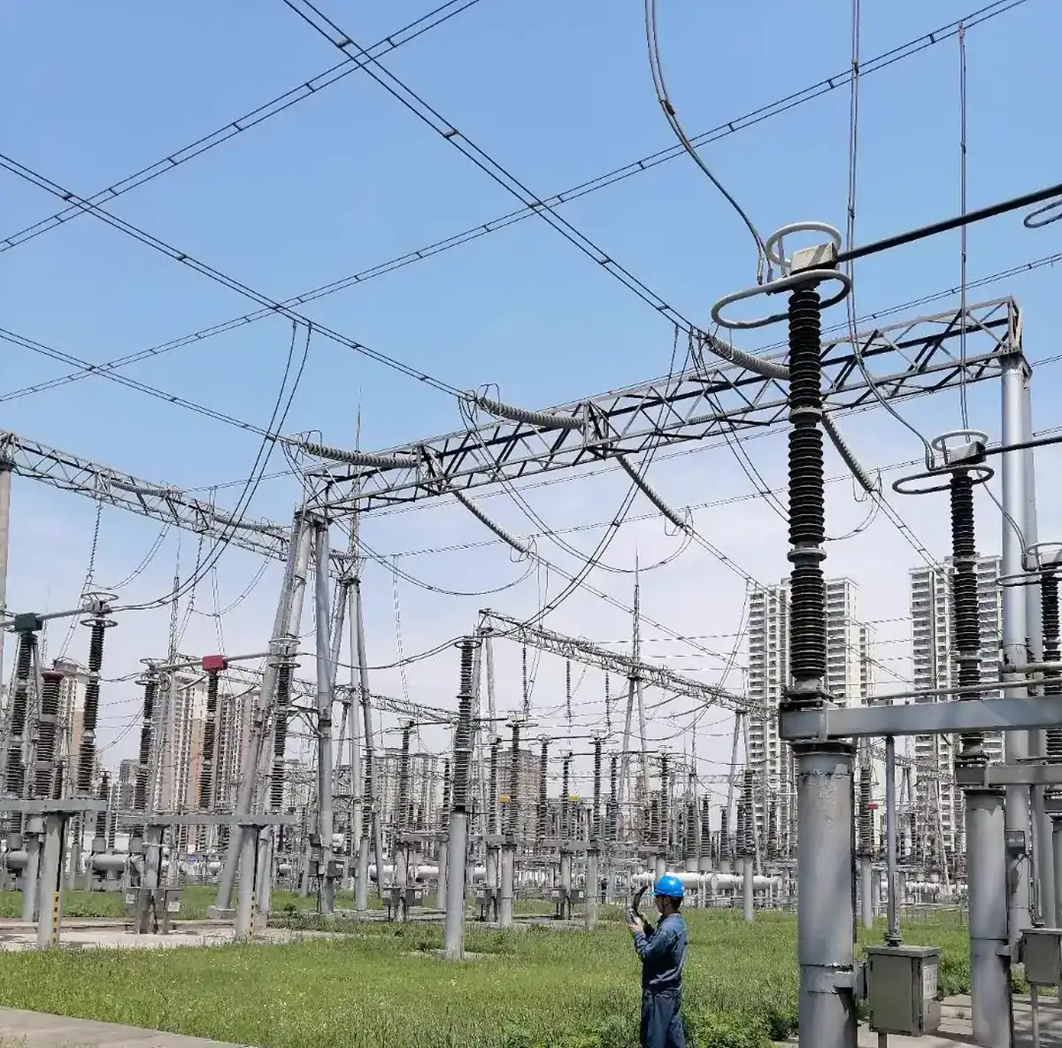Anonymized outdoor substation equipment during inspection